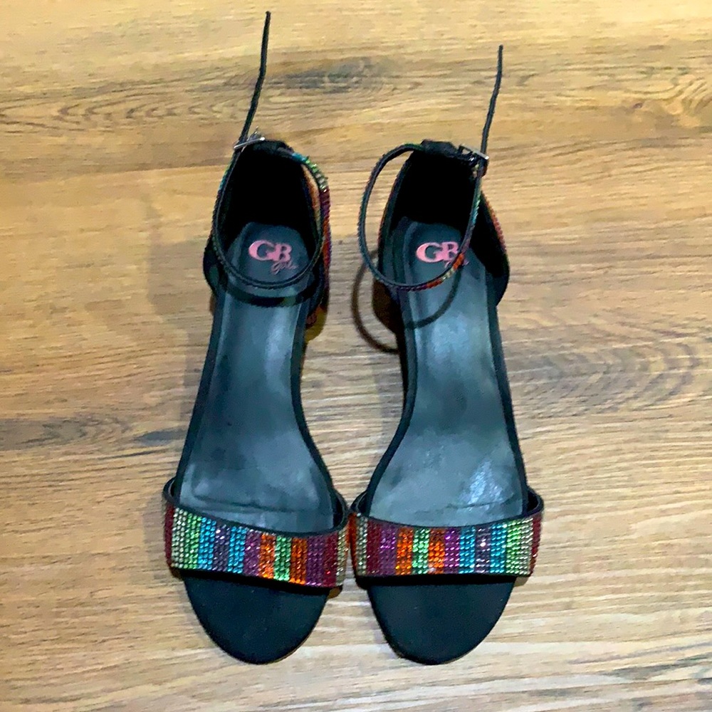 It’s black and multi color girls sandals